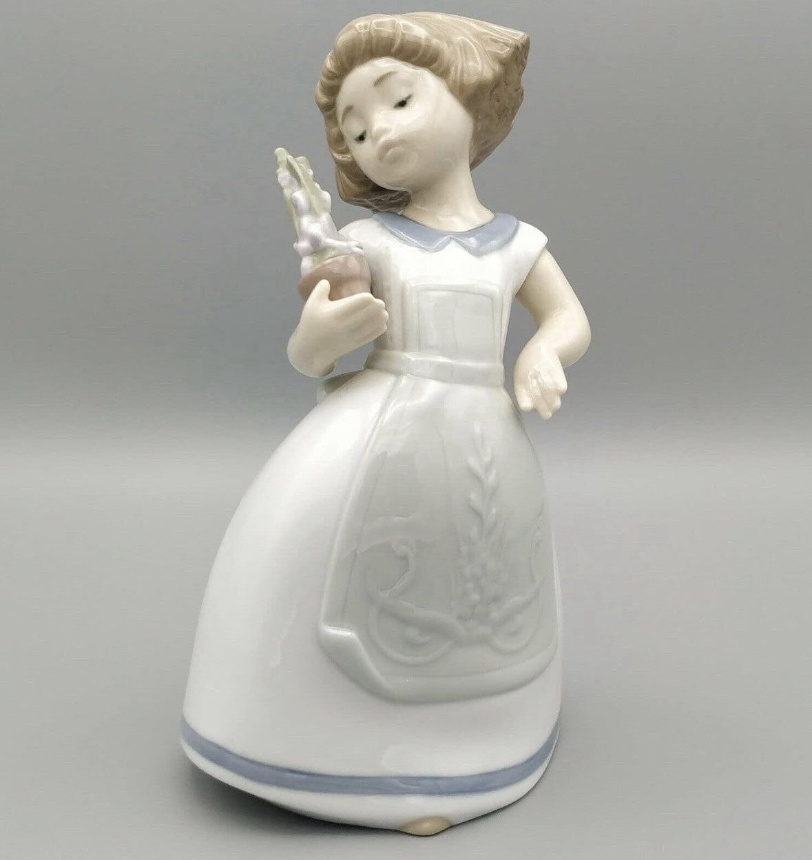 NAO by Lladro Potted Bloom Girl | Hand-Painted Porcelain Figurine | Made in Spain | New Boxed