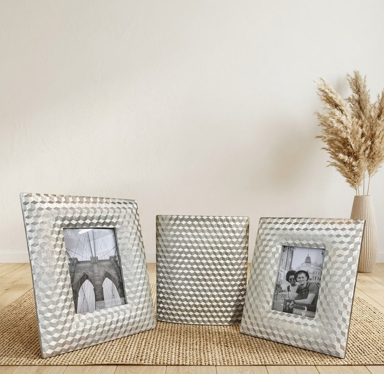 Home accessories including photo frames, mirror trays and candle holders