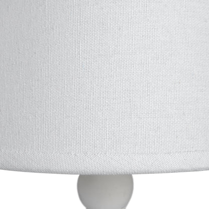 Symi slim table lamp styled on a bedside