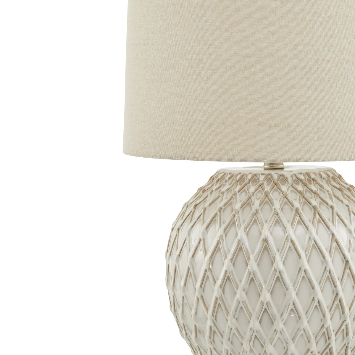Lattice ceramic table lamp styled on a side table