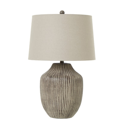 Ochre carved table lamp textured base detail