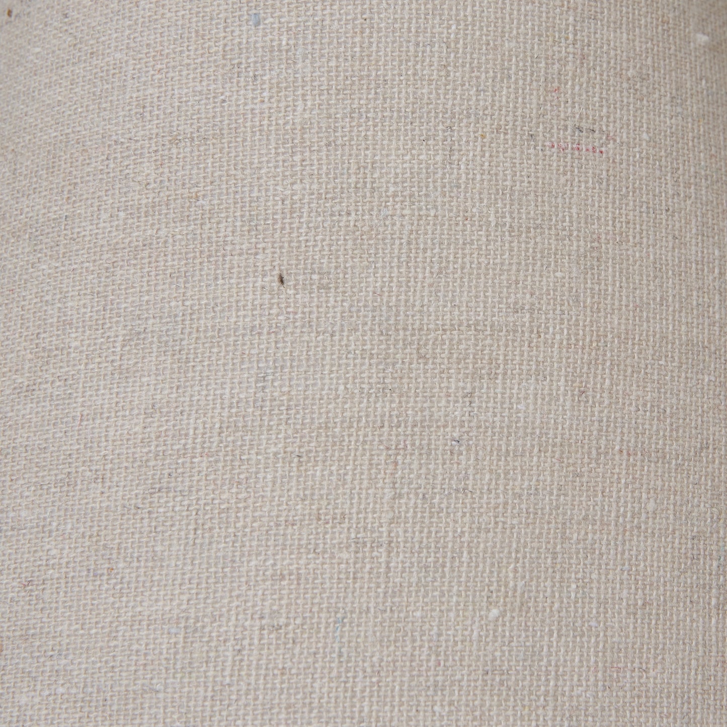 Setia column table lamp shown on a shelf