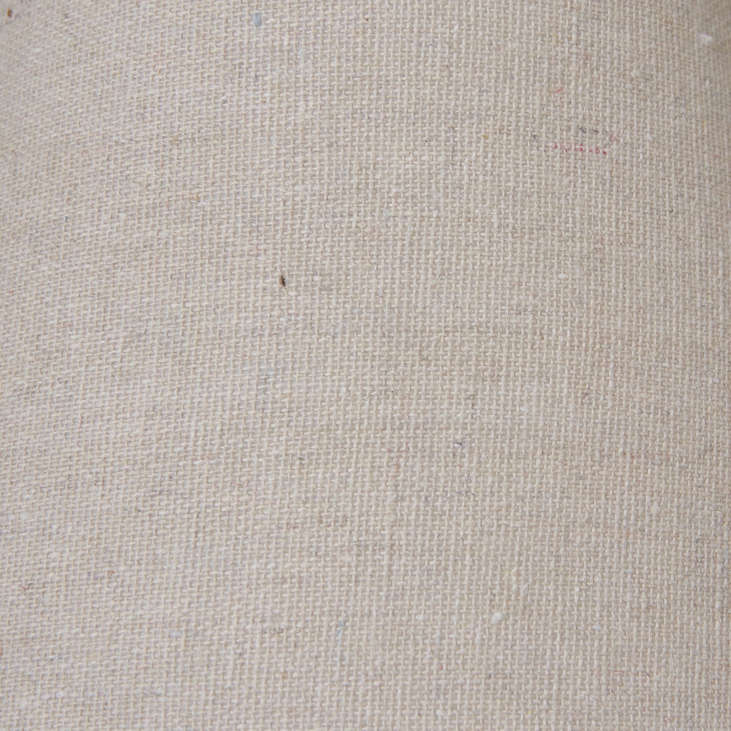 Setia column table lamp shown on a shelf