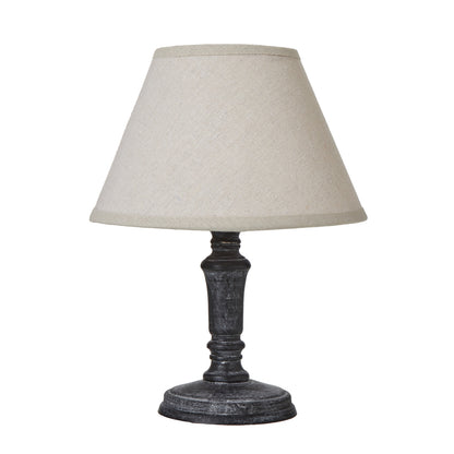 Palmyra column table lamp with distressed dark base and linen shade