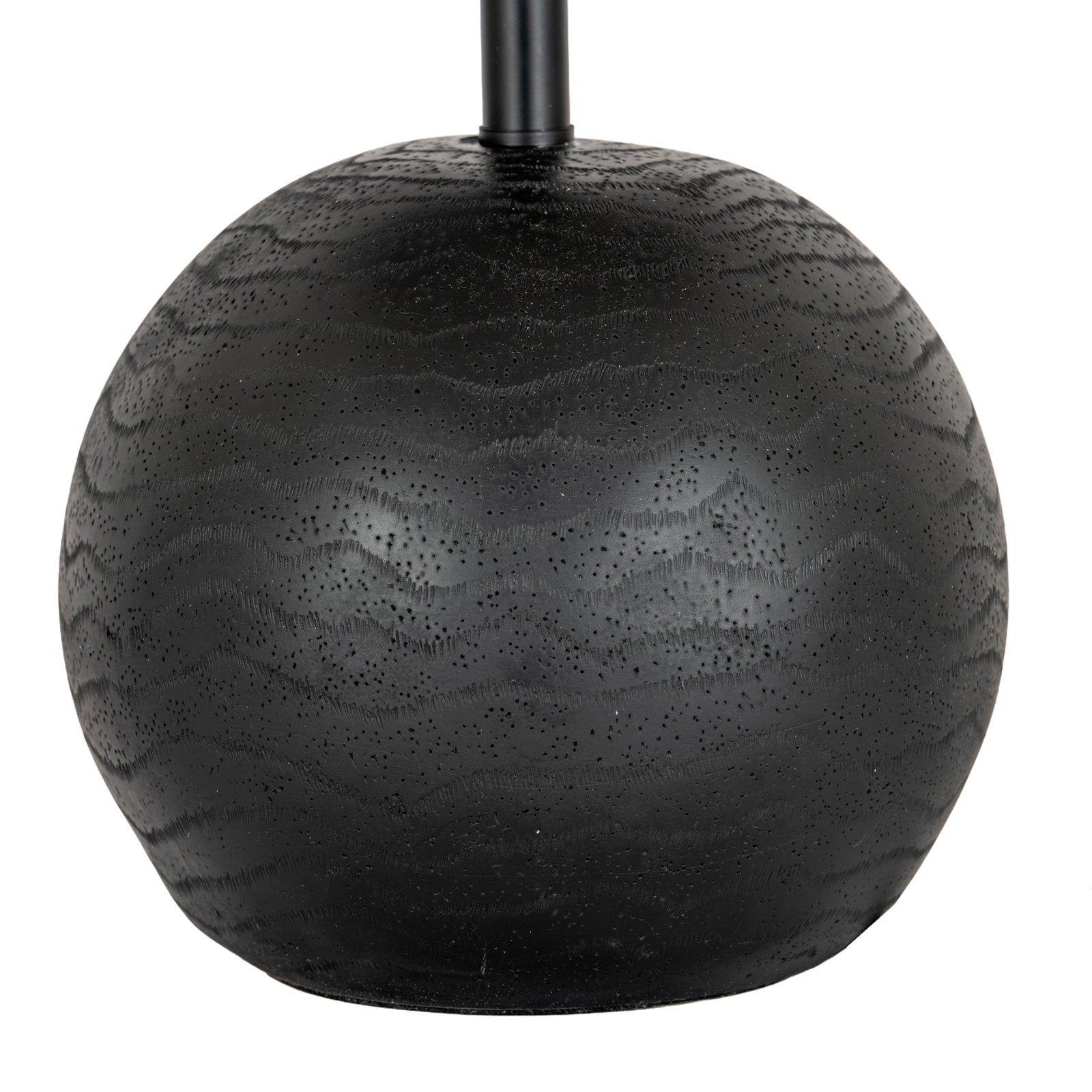Black cannon table lamp styled in an industrial interior