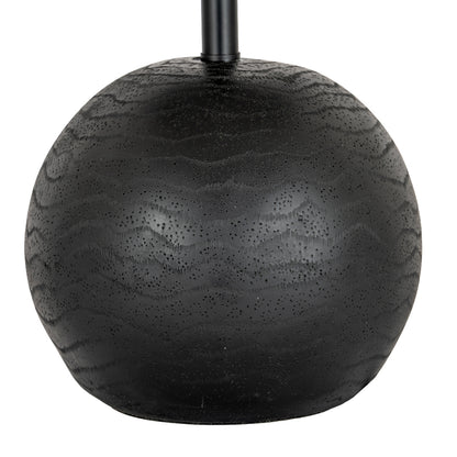 Black cannon table lamp styled in an industrial interior