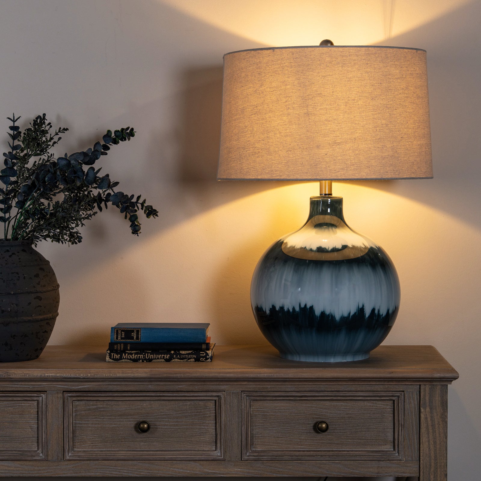 Ocean Shadows table lamp in layered blue glass with linen shade