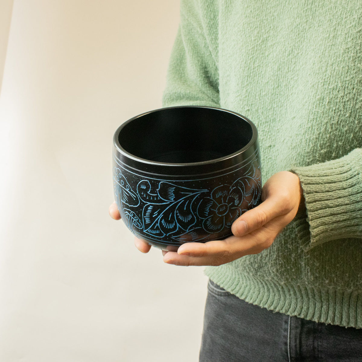 Blue Magic Mushroom cauldron singing bowl held in both hands