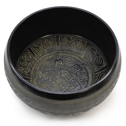 Alternative angle showing the engraved Buddha panels inside the Five Buddha bowl