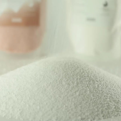Unfragranced candle sand in white, product video with a close-up of the sand texture